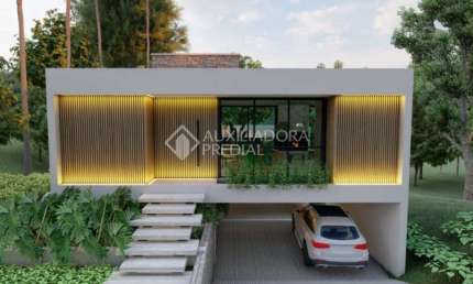 Casa em condomínio fechado com 3 quartos à venda na Avenida Dona Frutuosa, 1000, Coronel Nassuca, Guaíba, 250 m2 por R$ 1.267.000