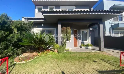Casa com 3 quartos à venda na Rua Ivo Lessa Silveira, 160, Parque 35, Guaíba, 270 m2 por R$ 1.200.000