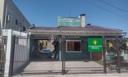 Casa com 3 quartos à venda na Rua Tocantins, 181, Parque 35, Guaíba, 122 m2 por R$ 550.000