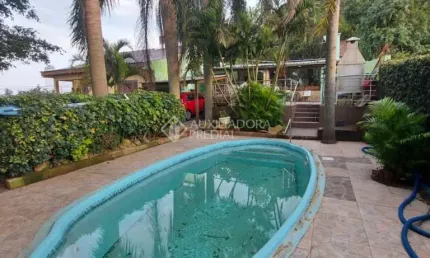 Casa com 2 quartos à venda na Travessa Jorge Elejalde, 823, Ermo, Guaíba, 68 m2 por R$ 350.000