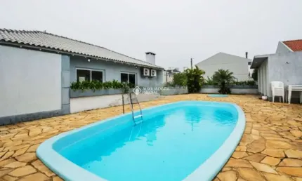 Casa em condomínio fechado com 3 quartos à venda na Rua República, 2050, Harmonia, Canoas, 86 m2 por R$ 900.100