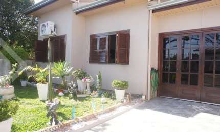 Casa em condomínio fechado com 3 quartos à venda na Rua Visconde de Taunay, 73, Harmonia, Canoas, 105 m2 por R$ 480.000