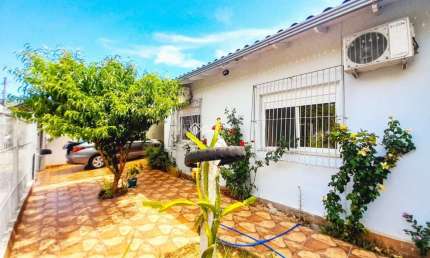 Casa em condomínio fechado com 3 quartos à venda na Rua das Orquídeas, 48, Harmonia, Canoas, 98 m2 por R$ 575.000