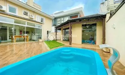 Casa com 3 quartos à venda na Rua Geórgia, 256, Marechal Rondon, Canoas, 218 m2 por R$ 1.550.000