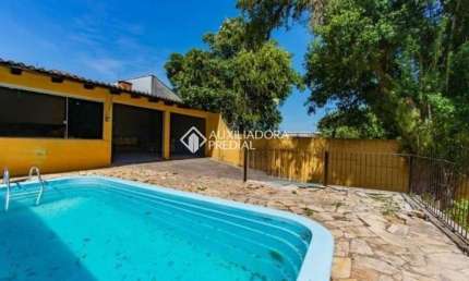 Casa com 3 quartos à venda na Rua Expedicionário, 293, Nossa Senhora das Graças, Canoas, 200 m2 por R$ 580.000