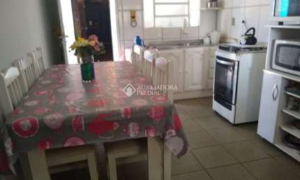 Casa com 3 quartos à venda na Bastian, 104, Piratini, Alvorada, 60 m2 por R$ 212.000
