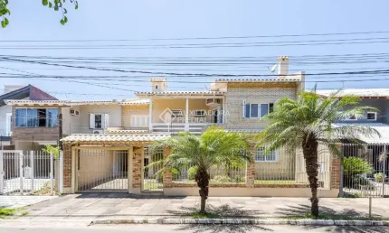 Casa com 5 quartos à venda na Rua Escócia, 51, Marechal Rondon, Canoas, 261 m2 por R$ 2.150.000