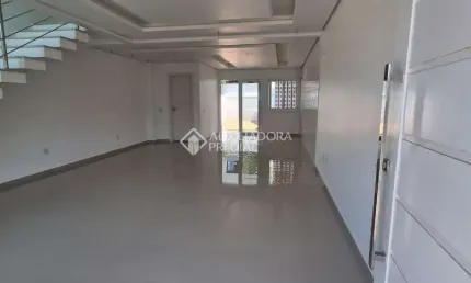 Casa em condomínio fechado com 3 quartos à venda na Rua Ana Abruzzi, 130, Mário Quintana, Porto Alegre, 110 m2 por R$ 599.099