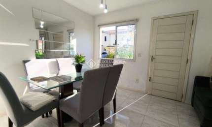 Casa em condomínio fechado com 3 quartos à venda na Rua dos Guaramirins, 303, Igara, Canoas, 107 m2 por R$ 395.000