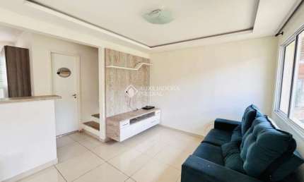 Casa em condomínio fechado com 3 quartos à venda na Rua dos Guaramirins, 303, Igara, Canoas, 109 m2 por R$ 442.000
