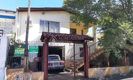 Casa em condomínio fechado com 3 quartos à venda na Rua Barão do Ladário, 45, São José, Canoas, 277 m2 por R$ 424.000