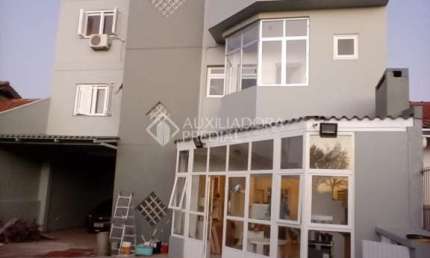 Casa em condomínio fechado com 4 quartos à venda na Rua Doutor João César Krieger, 127, Rubem Berta, Porto Alegre, 468 m2 por R$ 1.100.000
