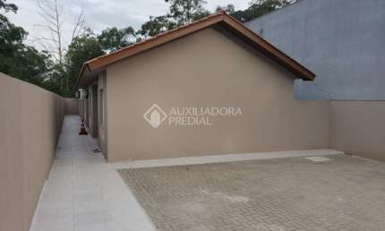 Casa em condomínio fechado com 2 quartos à venda na Avenida Doutor Sezefredo Azambuja Vieira, 5995, Olaria, Canoas, 36 m2 por R$ 200.100