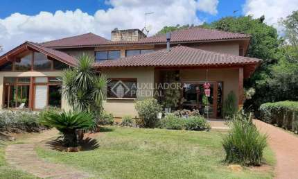Casa em condomínio fechado com 6 quartos à venda na Via Do Sol Poente, 546, Girassol, Gravataí, 400 m2 por R$ 1.750.000