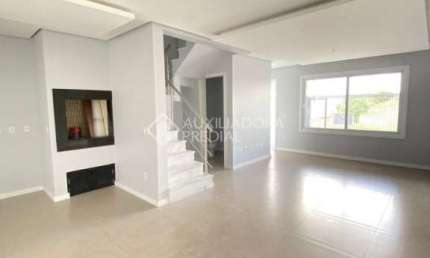 Casa em condomínio fechado com 3 quartos à venda na Rua Ravena, 66, Estância Velha, Canoas, 125 m2 por R$ 689.990
