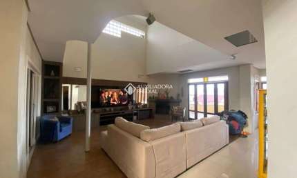 Casa com 3 quartos à venda na Rua Joaquim Cruz, 130, Santo Antônio, Porto Alegre, 330 m2 por R$ 1.400.000