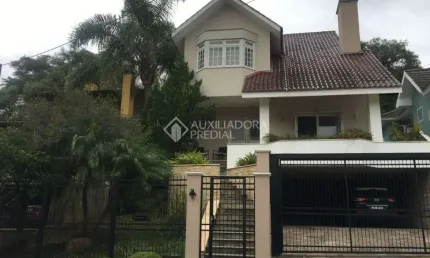 Casa em condomínio fechado com 3 quartos à venda na Rua Cangerana, 660, São Lucas, Viamão, 222 m2 por R$ 1.100.000