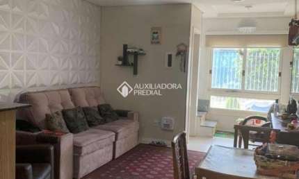 Casa em condomínio fechado com 3 quartos à venda na Rua Dante Poggetti, 326, Jardim Itu Sabará, Porto Alegre, 113 m2 por R$ 525.000