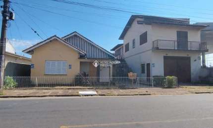 Casa em condomínio fechado com 3 quartos à venda na Rua Machadinho, 35, Rio Branco, Canoas, 280 m2 por R$ 450.000