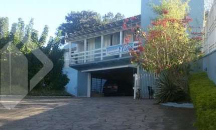 Casa em condomínio fechado com 4 quartos à venda na Avenida João Carlos Viale Dias, 1347, Tarumã, Viamão, 333 m2 por R$ 2.180.000