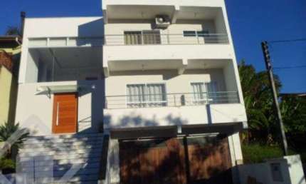 Casa em condomínio fechado com 3 quartos à venda na Avenida Senador Salgado Filho, 6614, Jardim Krahe, Viamão, 400 m2 por R$ 950.000