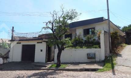 Casa em condomínio fechado com 3 quartos à venda na Rua Edson Wanderlei Santos Machado, 48, Parque Índio Jari, Viamão, 400 m2 por R$ 279.000