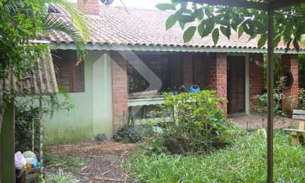 Casa em condomínio fechado com 4 quartos à venda na Rua Caroba, 105, Cantegril, Viamão, 109 m2 por R$ 400.000