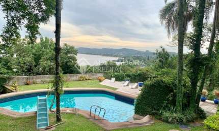 Casa com 4 quartos à venda na Rua Charruas, 160, Espírito Santo, Porto Alegre, 1000 m2 por R$ 2.640.000