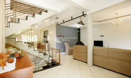 Casa com 5 quartos à venda na rua isidoro tressi, 507, jardim botânico, porto alegre, 379 m2 por r$ 1.550.000