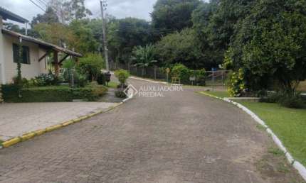 Terreno em condomínio fechado à venda na Rua Cedro, 170, São Lucas, Viamão por R$ 104.000
