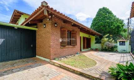 Casa em condomínio fechado com 3 quartos à venda na Rua Doutor Fernando Ortiz Schneider, 247, Partenon, Porto Alegre, 280 m2 por R$ 950.000