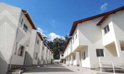 Casa em condomínio fechado com 3 quartos à venda na Avenida Prefeito Barreto Viana, 413, Santa Cecília, Viamão, 71 m2 por R$ 265.000
