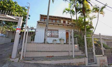Casa com 4 quartos à venda na Rua João Bonuma, 110, Coronel Aparício Borges, Porto Alegre, 483 m2 por R$ 889.000