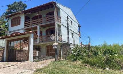 Casa com 1 quarto à venda na Rua Taveira Júnior, 471, Nonoai, Porto Alegre, 2500 m2 por R$ 1.200.000