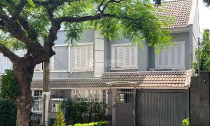 Casa em condomínio fechado com 3 quartos à venda na Rua Doutor Barbosa Gonçalves, 230, Chácara das Pedras, Porto Alegre, 186 m2 por R$ 1.350.000