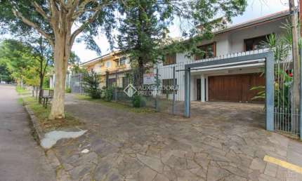 Casa com 4 quartos à venda na Rua Doutor Prudente de Moraes, 374, Chácara das Pedras, Porto Alegre, 374 m2 por R$ 1.550.000