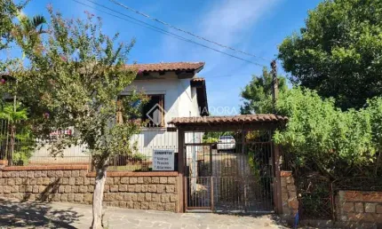 Casa com 3 quartos à venda na Rua Atílio Supertti, 287, Vila Nova, Porto Alegre, 198 m2 por R$ 750.000