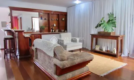 Casa com 3 quartos à venda na rua teixeira de carvalho, 215, medianeira, porto alegre, 181 m2 por r$ 940.000