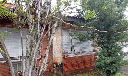 Casa com 3 quartos à venda na Rua Rossini, 75, São Sebastião, Porto Alegre, 144 m2 por R$ 750.000