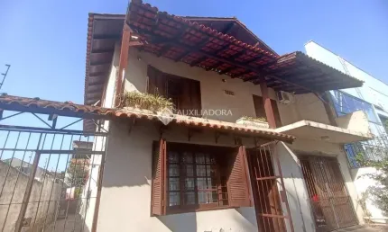 Casa com 3 quartos à venda na avenida doutor petrônio portella, 1415, parque santa fé, porto alegre, 267 m2 por r$ 850.000
