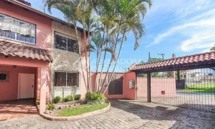 Casa em condomínio fechado com 3 quartos à venda na ARACY BARCELOS FONSECA, 68, Oriço, Gravataí, 149 m2 por R$ 390.000