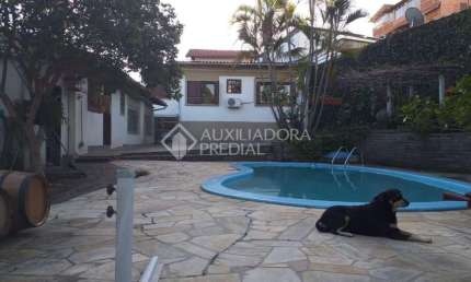 Casa em condomínio fechado com 4 quartos à venda na Rua Primeiro de Maio, 42, Partenon, Porto Alegre, 336 m2 por R$ 1.350.000