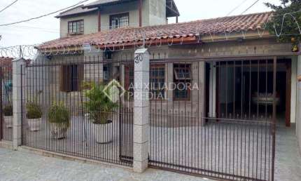 Casa em condomínio fechado com 2 quartos à venda na Rua José Pedro de Souza, 30, Vila Nova, Porto Alegre, 170 m2 por R$ 430.000