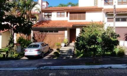 Casa em condomínio fechado com 4 quartos à venda na Rua Fernando Osório, 90, Teresópolis, Porto Alegre, 195 m2 por R$ 1.350.000
