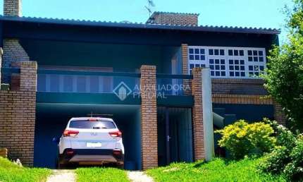 Casa em condomínio fechado com 4 quartos à venda na Rua dos Guananas, 290, Espírito Santo, Porto Alegre, 200 m2 por R$ 585.000