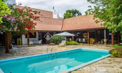 Casa em condomínio fechado com 6 quartos à venda na Avenida da Cavalhada, 5205, Cavalhada, Porto Alegre, 701 m2 por R$ 4.000.000