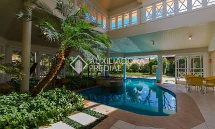 Casa em condomínio fechado com 4 quartos à venda na Avenida da Cavalhada, 5205, Cavalhada, Porto Alegre, 927 m2 por R$ 6.000.000