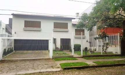 Casa em condomínio fechado com 4 quartos à venda na Rua Bororó, 225, Vila Assunção, Porto Alegre, 564 m2 por R$ 1.940.000