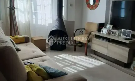 Casa com 3 quartos à venda na Rua Marcelo Küfner, 58, Hípica, Porto Alegre, 205 m2 por R$ 749.000
