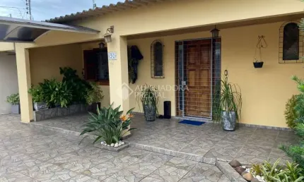 Casa com 3 quartos à venda na Rua Caetano Fulginiti, 30, Rubem Berta, Porto Alegre, 70 m2 por R$ 370.000